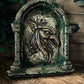 Decorative sculpted stone wall arched window with Griffin head, branded 'Sea of Curiosities'.
