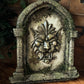 Decorative sculpted stone wall arched window with Lion head, branded 'Sea of Curiosities'.